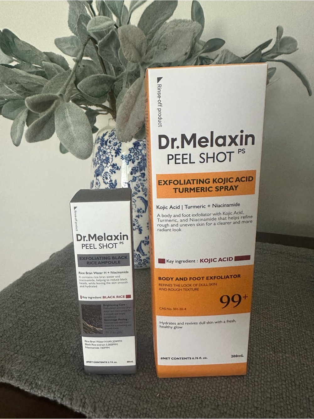 Dr. Melaxin Peel Shot Exfoliating Kojic Acid Turmeric Spray and black rice